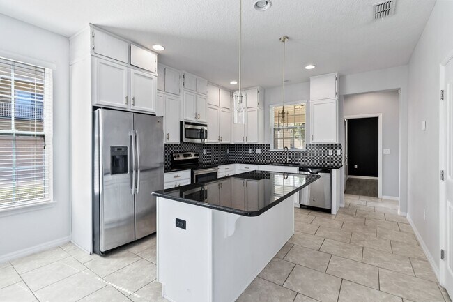 Building Photo - Beautiful 4/2.5 Townhome For Rent in Harmony