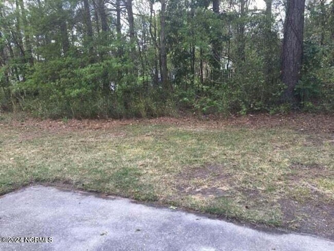 Building Photo - Welcome to Village Cedars!