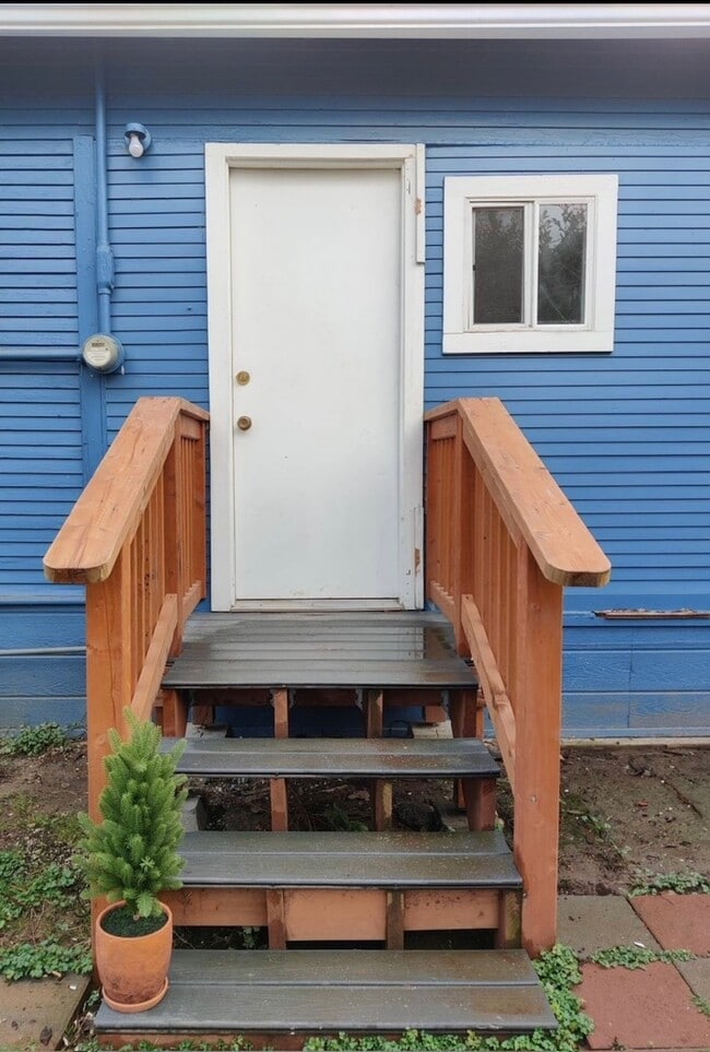 Back porch and exit to yard - 8117 N Olympia St