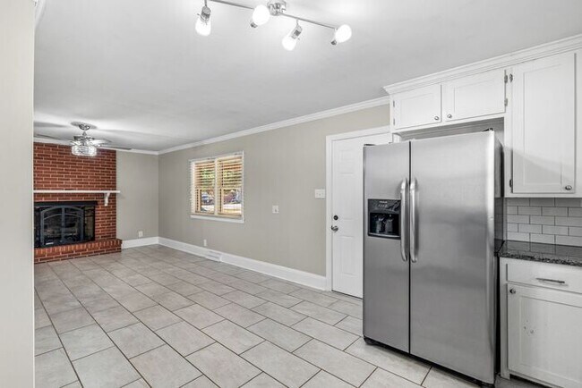 Building Photo - Elon - Large Brick Home, Hardwoods, Granite Counter-Tops, SS Appliances, Fire Place, Carport - Mu...