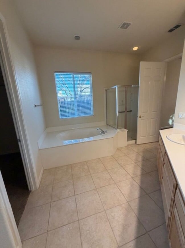 Building Photo - Beautiful 2 Bedroom and 2 Bathroom Home with 3 Car Garage in 55+ Gated Community $2,795.00