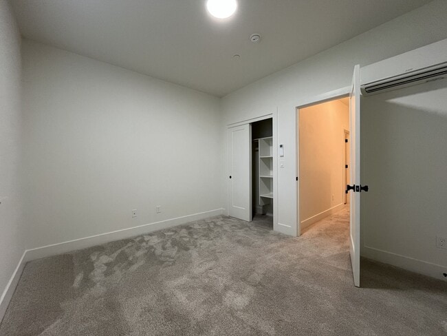 Building Photo - Modern 2-Bed, 1.5-Bath Condo with Custom Kitchen, Private Patio, and Prime Location