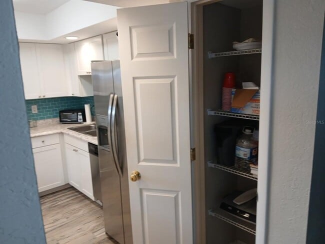 Building Photo - 10350 Imperial Point Dr W