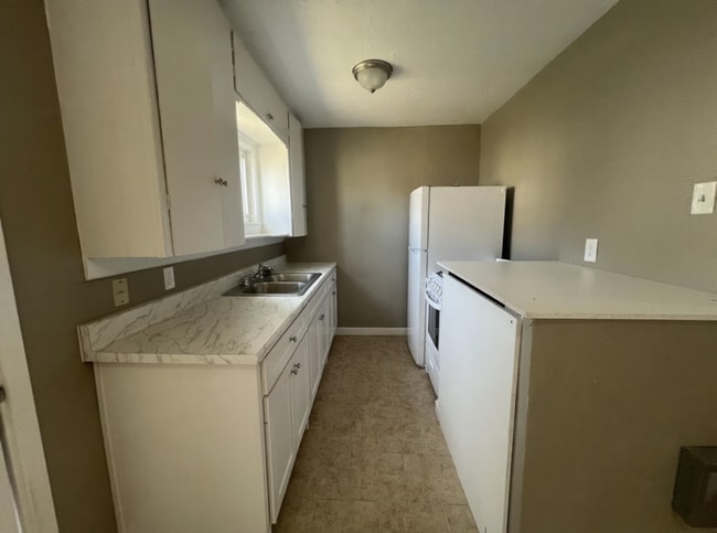 Building Photo - New Management, New Look, New You!