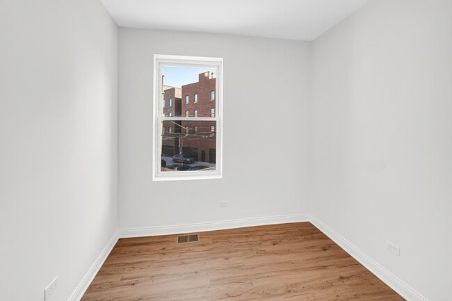 Building Photo - 1225 N Milwaukee Ave