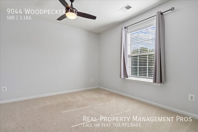 Building Photo - 9044 Woodpecker Ct