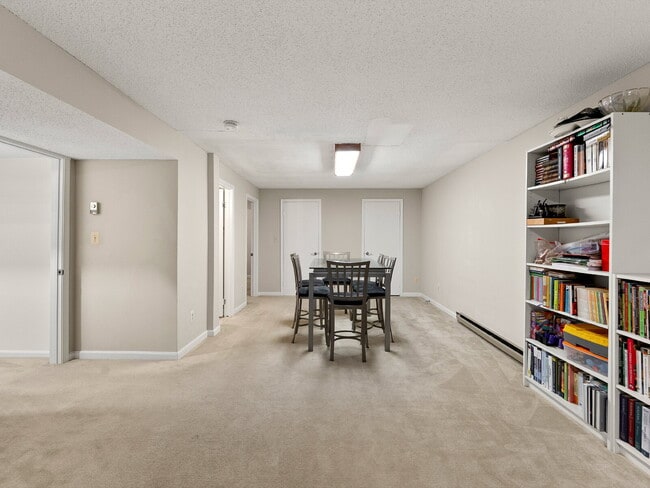 Building Photo - "Stunning 4-Bed Gem with Finished Basement...