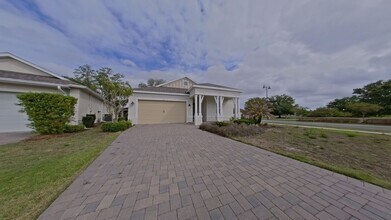 Building Photo - Resort-Style 55+ Living in Four Seasons at Orlando | Upgraded Corner Lot Home