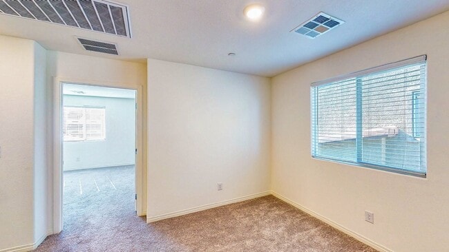Building Photo - Cozy 2-story, 3BR 2BA townhome in a new community in North Las Vegas.
