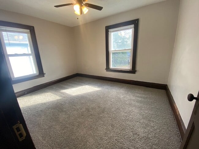 Building Photo - Updated 4-Bed with Porch & 2-Car Garage on...