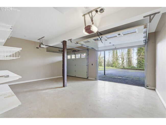 Building Photo - One-of-a-Kind 5BR Home with Floor-to-Ceiling Windows, Wraparound Decks & Breathtaking Treeline Views