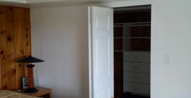 Walk-in closet is off master bedroom and is approximately half as large as bedroom. - 8261 Northrop Plz SW