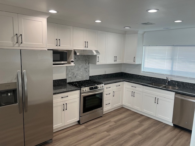 new: cabinets, granite countertops, appliances - 22963 16th St