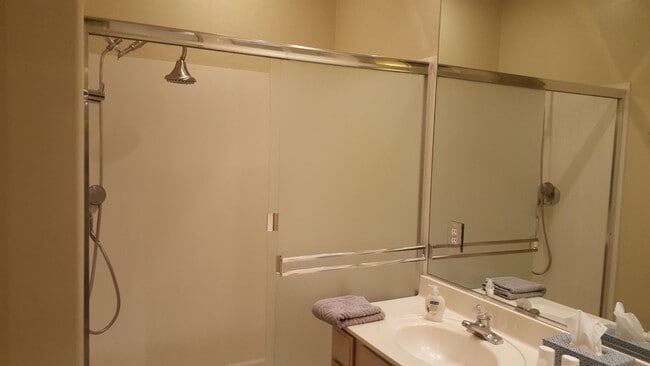 Building Photo - Luxurious 2-Bed/2-Bath Condo in Quiet Gated Community - Coming Soon!