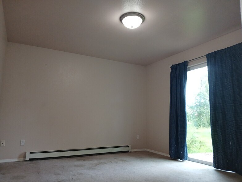 Downstairs bedroom-french doors - 320 E Victor Cir