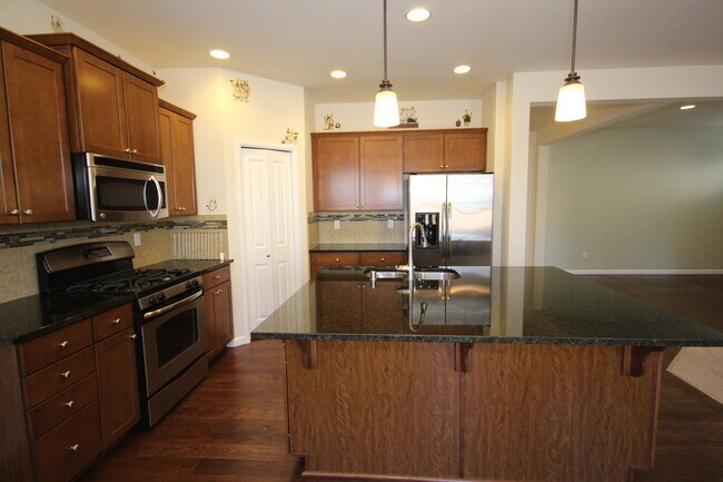 Building Photo - Beautiful Family Home with Bonus Room, Storage & Fenced Yard