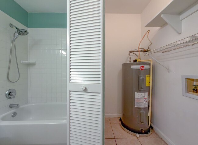 Building Photo - LOVELY & Modern NW 2/1 w/ New Flooring & Huge Privacy Fenced Yard that Inc Lawn Maintenance! Avai...