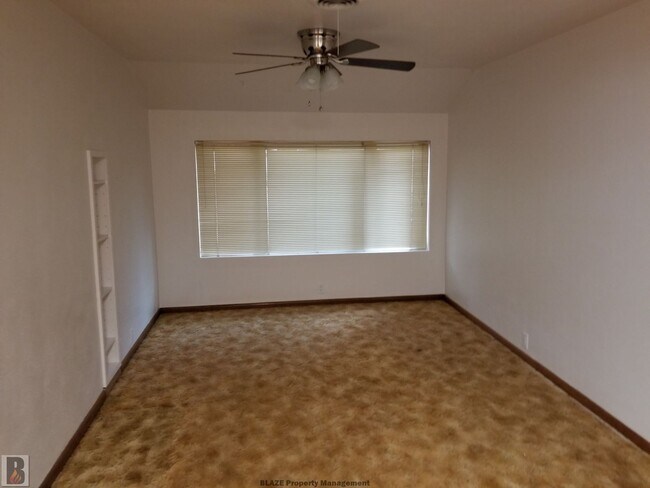 Building Photo - Massive Corner-Lot Home with Retro Charm & Shady Backyard!