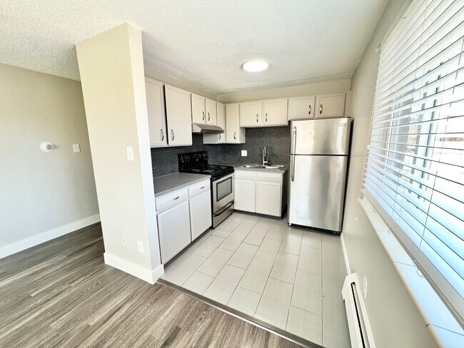 Experience the elegance of this contemporary kitchen, designed for modern living. - Wadsworth Station West