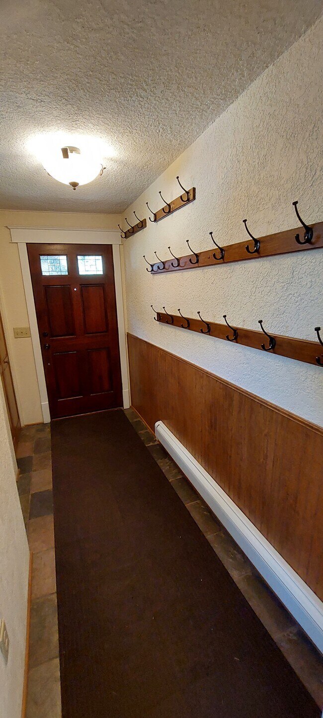 entry hall, coat hooks and closet - 520 S 9th St