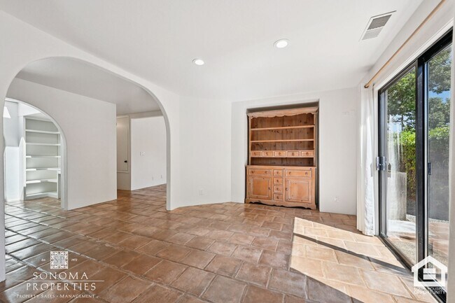 Building Photo - Southwestern Charm Meets Modern Comfort — 2BR/2BA Condo with Access to Shared Pool!