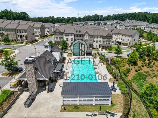 Building Photo - Modern 3-level Townhome featuring 4 bedroo...