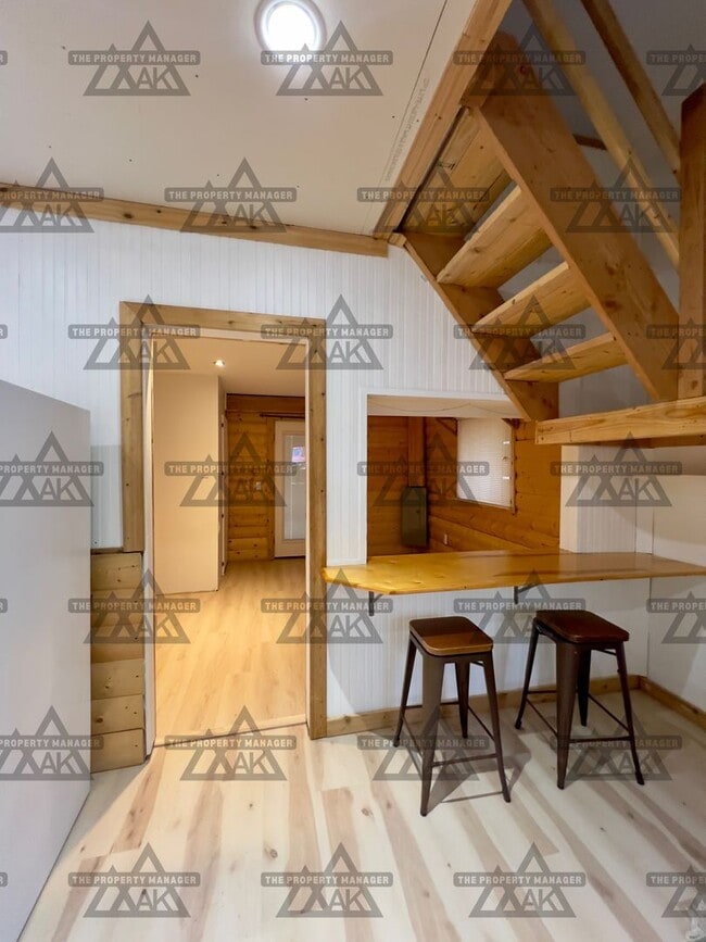 Building Photo - Cozy 1-Bedroom Loft Home with Office & Cov...