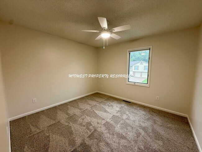 Building Photo - Spacious 3 Bedroom Home with Finished Basement, Covered Deck & Fenced Yard