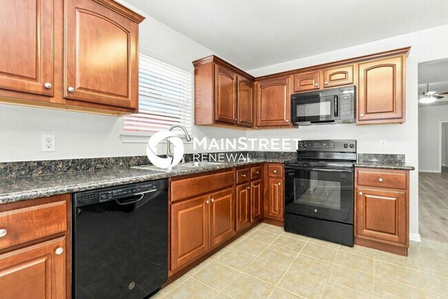 Building Photo - 4 Bedroom Pet-Friendly Home in Conroe, TX with Main Street Renewal