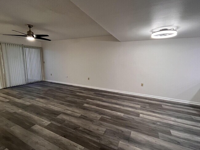 Building Photo - Two-story condominium, featuring 2 bedrooms and 2 1/2 bathrooms