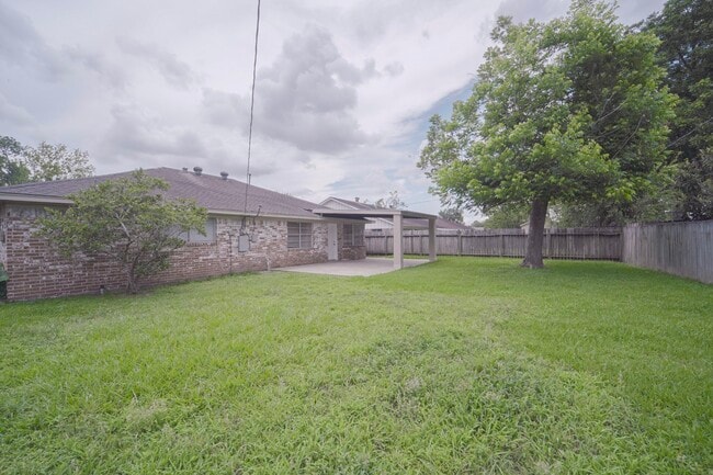 Building Photo - 9811 Mango St
