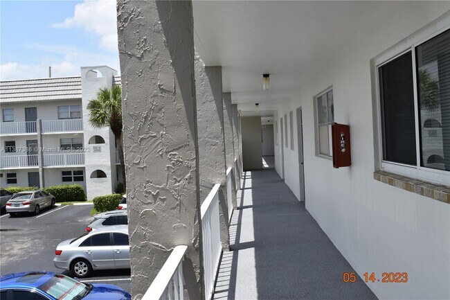 Building Photo - 8590 Sunrise Lakes Blvd