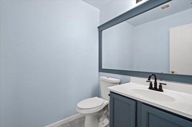 Building Photo - Multiple Living Areas 4-Bedroom Retreat with Vaulted Ceilings & No Carpet