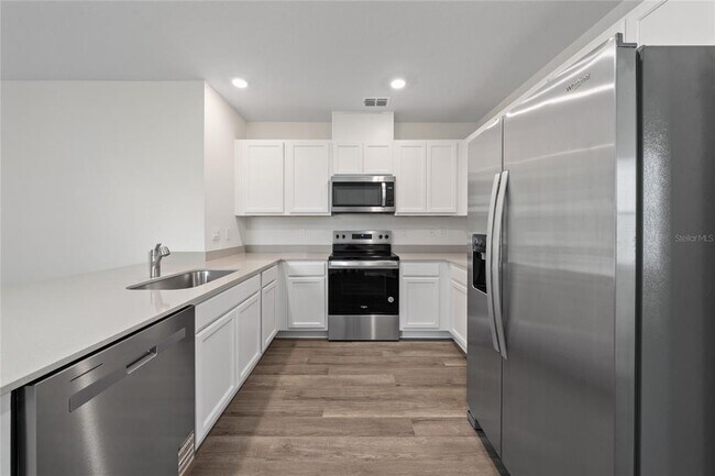 Building Photo - 8347 Madrid St