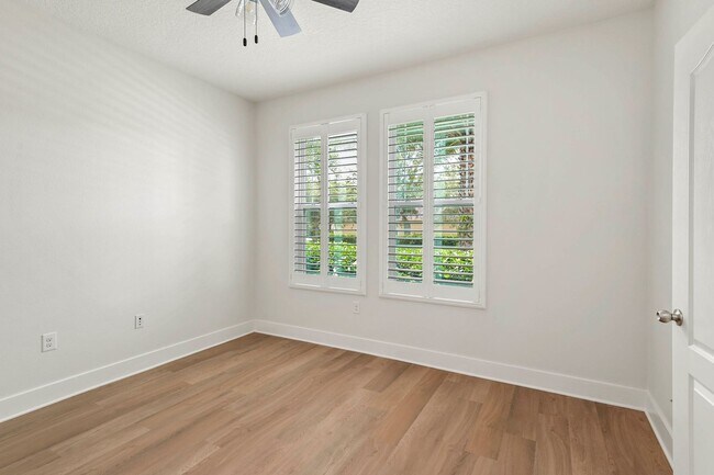 Building Photo - Expansive 4 bedroom, 3 bath remodeled home in gated community
