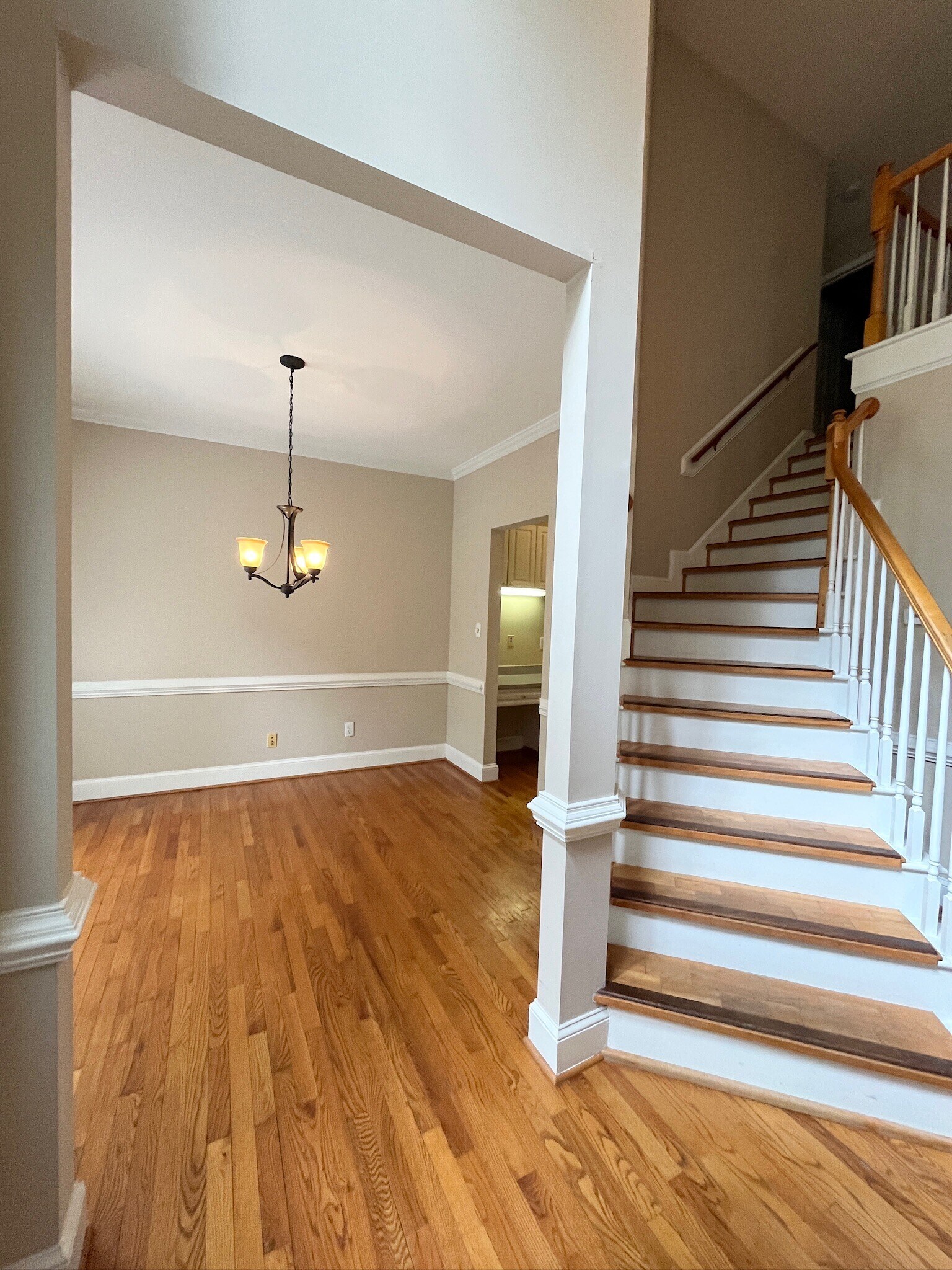 formal dining/staircase - 8601 Abbotsbury Ct