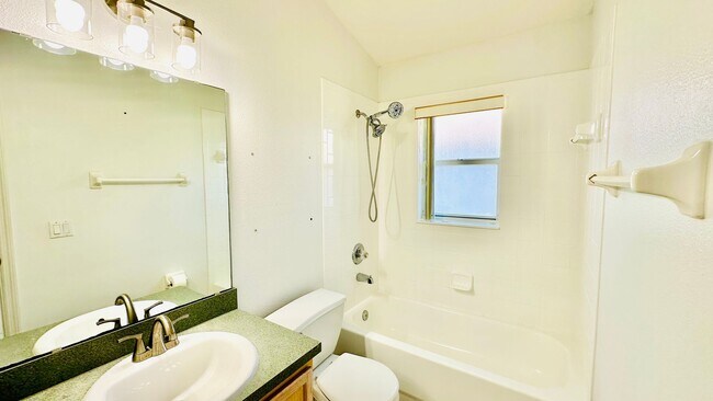 Building Photo - Relax & recharge in this Charming 3Bedroom...