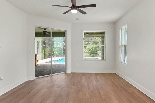 Building Photo - Expansive 4 bedroom, 3 bath remodeled home in gated community