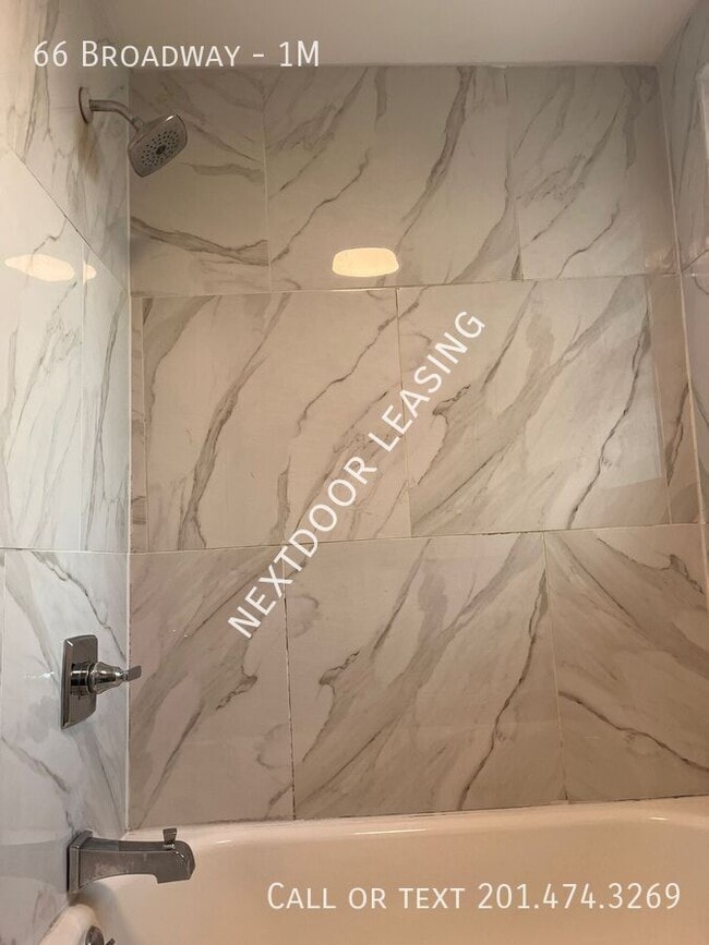 Building Photo - 66 Broadway-1M