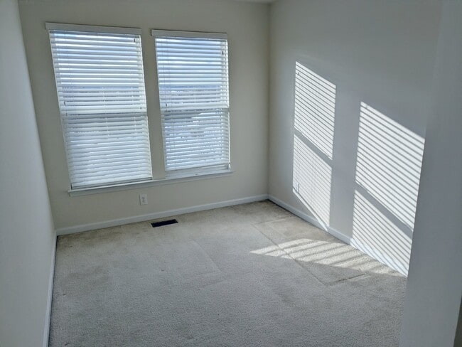 Building Photo - Brambleton Elegance: A Spacious Townhome Oasis