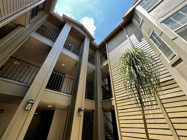Building Photo - NEW-Remodeled bathroom & kitchen! NEW VINYL PLANK flooring & fresh paint! 2 bedroom 1 bath condo ...