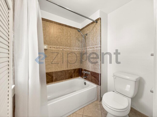 Building Photo - 9534 Swinton Ave