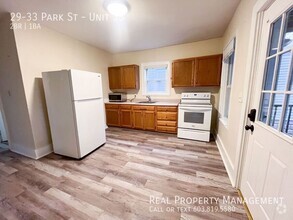 Building Photo - Pet-Friendly, Downtown 2-Bed with Heat and...