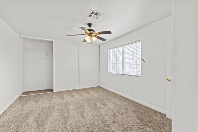 Building Photo - "Charming 3-Bedroom Townhouse Oasis with 2 Full Baths in Las Vegas – 1220 Sq Ft of Comfortable Li...