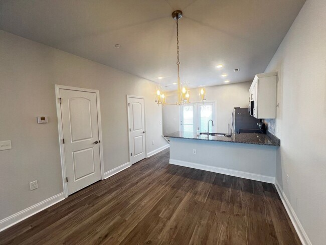 Building Photo - Available Now! - Pet Friendly 2 Bedroom, 2.5 Bath Townhome at Market Common! Cable and Internet I...