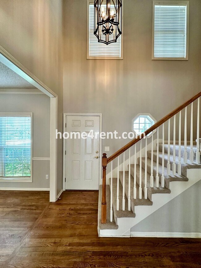 Building Photo - Beautiful Four-Bedroom Home with Three Car...