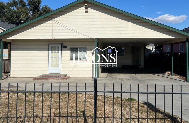 Primary Photo - Charming 3-bedroom home with carport parki...