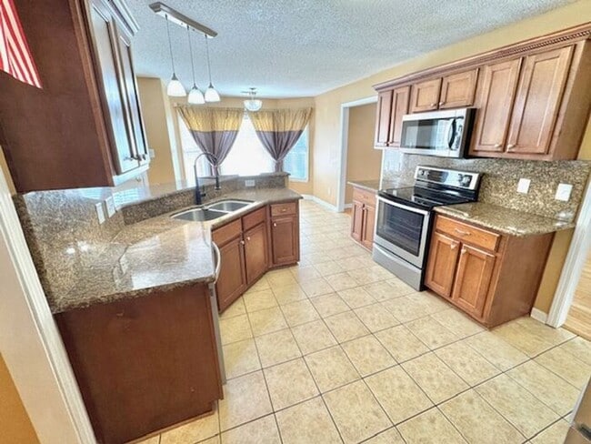 Building Photo - MOVE IN SPECIAL!!! Now leasing a 4-bedroom 2.5 bath home in Arlington. Great location and great s...