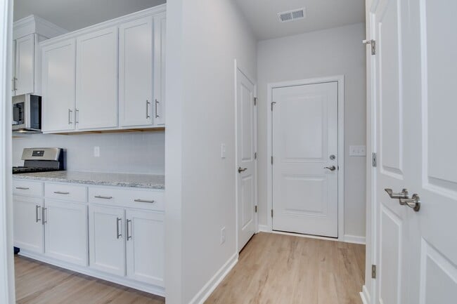 Building Photo - Stunning 4-Bedroom, 3-Bath New Construction Home with Master on Main and Upstairs Retreat