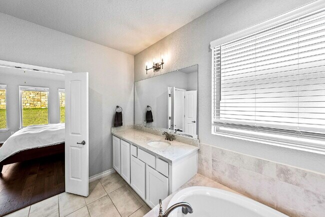 Building Photo - Rare Cibolo Canyons Opportunity | Guest Suite Downstairs, Optional 5th Bedroom, No Carpet, No Rea...